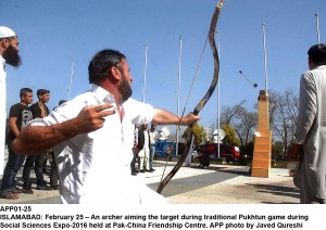 APP01-25 ISLAMABAD: February 25  An archer aiming the target during traditional Pukhtun game during Social Sciences Expo-2016 held at Pak-China Friendship Centre. APP photo by Javed Qureshi