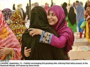 APP19-13 LAHORE: September 13 Faithful exchanging Eid greeting after offering Eidul Azha prayers at the Badshahi Masjid. APP photo by Rana Imran