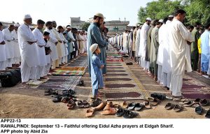 APP22-13 RAWALPINDI: September 13 Faithful offering Eidul Azha prayers at Eidgah Sharif. APP photo by Abid Zia