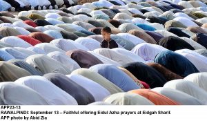 APP23-13 RAWALPINDI: September 13 Faithful offering Eidul Azha prayers at Eidgah Sharif. APP photo by Abid Zia