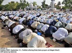 APP24-13 RAWALPINDI: September 13 Faithful offering Eidul Azha prayers at Eidgah Sharif. APP photo by Abid Zia