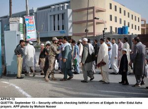 APP45-13 QUETTA: September 13 Security officials checking faithful arrives at Eidgah to offer Eidul Azha prayers. APP photo by Mohsin Naseer