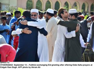 APP51-13 HYDERABAD: September 13 Faithful exchanging Eid greeting after offering Eidul Azha prayers at Eidgah Rani Bagh. APP photo by Akram Ali